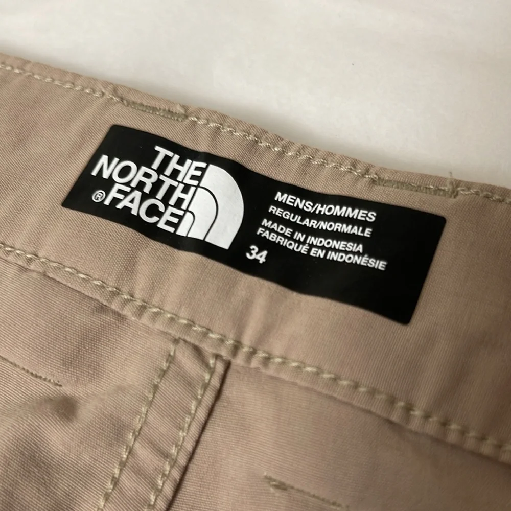 The North Face Tan Flat Front Shorts Versatile Style size 34 inseam 9 inches